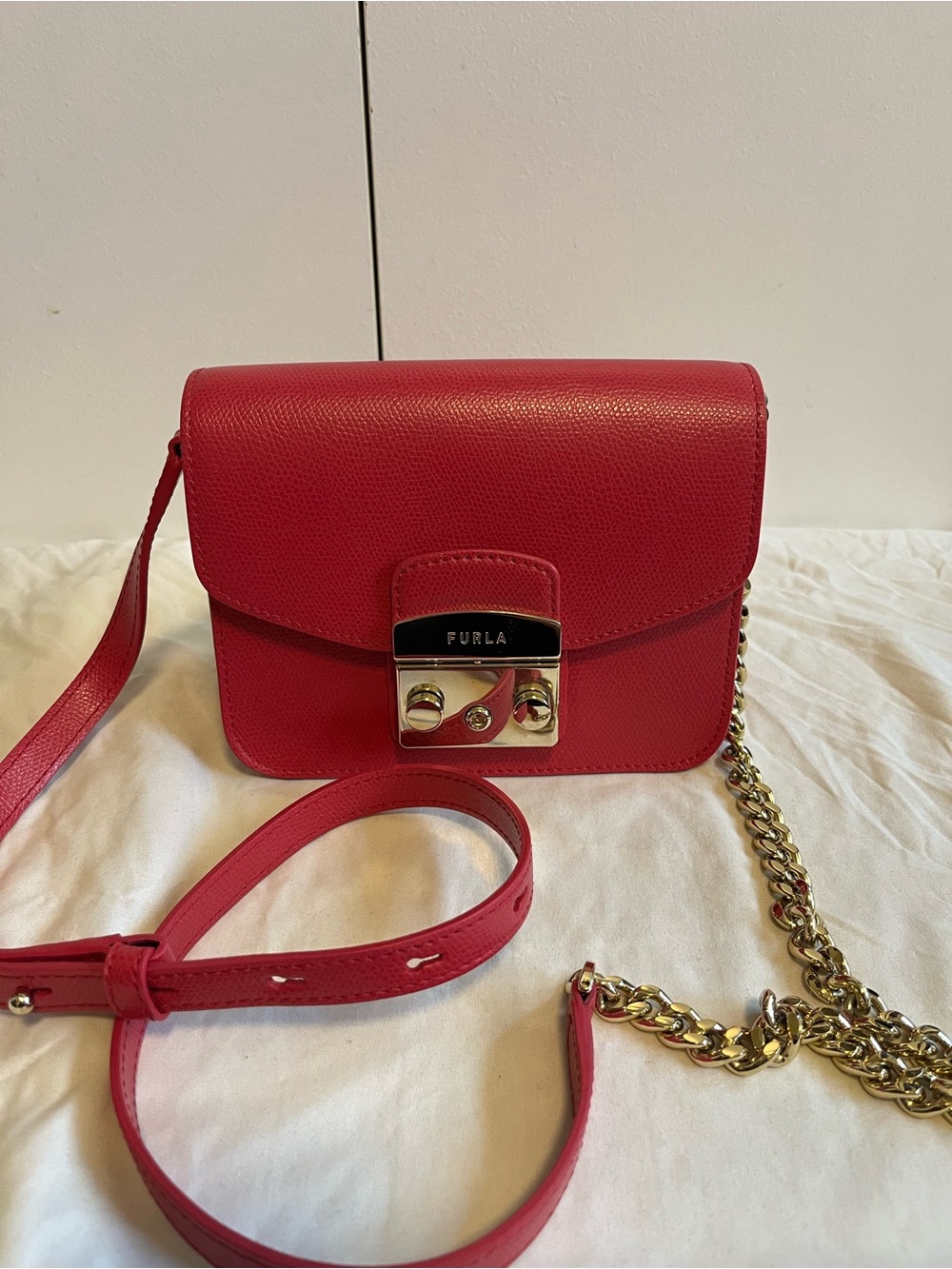 Furla metropolis crossbody in red/pink with gold hardware